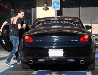 Illustration for article titled Twelve Ridiculous Celebrity Car Poses